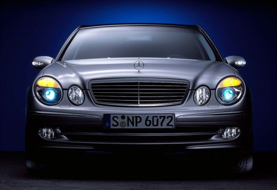 What is the MOST optical bus in the Mercedes E-Class (W211)