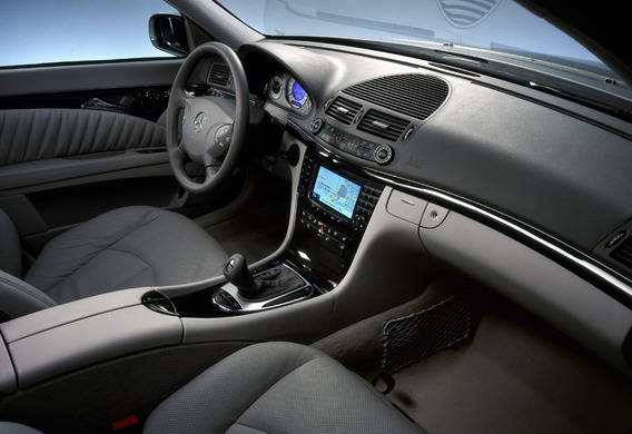 When the PASSENGER AIRBAG OFF alarm is activated on the Mercedes E-Class central console (W211)